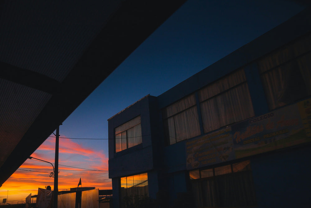 Building silhouette with a colorful sunset sky